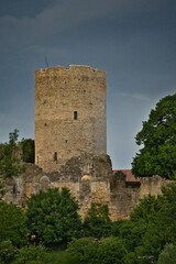 Fototapeta premium A castle with a tower and a blue flag on top