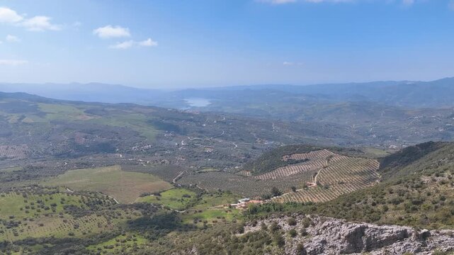 Aerial from Puerto de Sol lookout over vast Axarquia valley towards Lake Vinuela