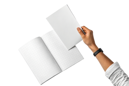 Latino hand places blank notebook on open grid paper journal