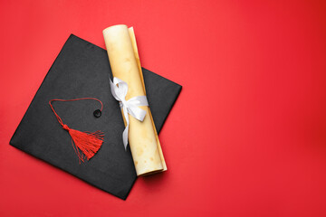 Diploma and graduation hat on red background, top view. Space for text