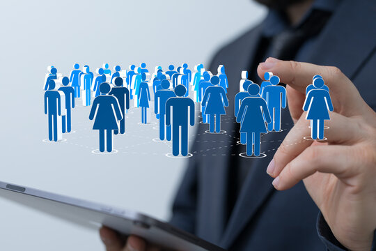 Businessman using tablet to manage a team or customer base. Digital people icons in the network, representing communication, social networking,