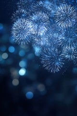 Vibrant festive Christmas background with shimmering sparkles and glowing blue bokeh lights creating a luxurious and joyful winter holiday atmosphere.