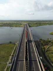 Special Region of Yogyakarta, Indonesia - October 15, 2025 : Aerial View Of Coastal Town With...