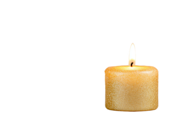 a small, golden candle with a flickering flame