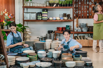Mother, Son, and Daughter Managing Family Business Ceramic Shop