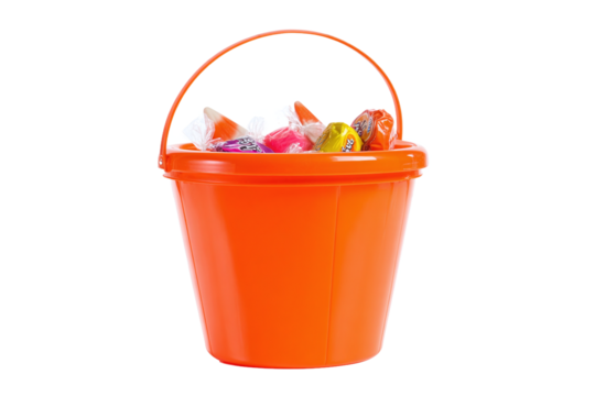 Orange halloween bucket full of colorful candies