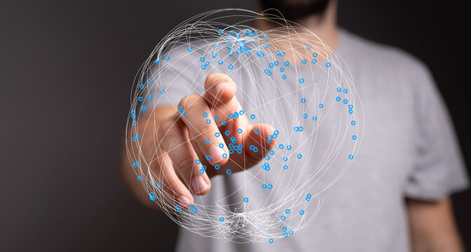 Hand reaching towards a digital sphere, representing connection, communication, and technology. Ideal for concepts like global networ - Powered by Adobe