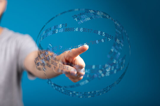 A person's finger touching a digital interface showcasing technology and data processing, symbolizing innovation and the future. - Powered by Adobe