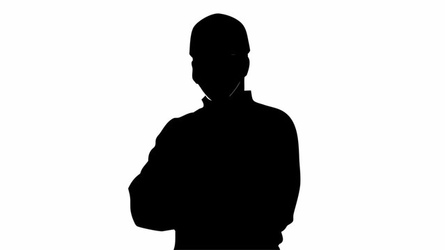 Silhouette of a person with arms crossed against a white background creating a stark contrast view
