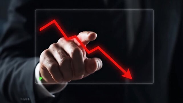 A businessman reverses a downward financial trend into a successful growth chart with a single swipe
