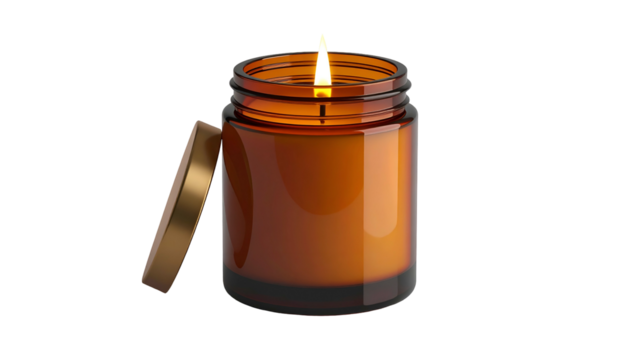 Lit fragrance vessel with unattached metallic cover rests against the side in darkness