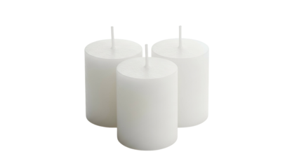 Three unlit white pillar candles are grouped together against a dark background