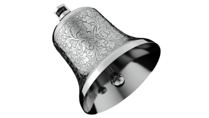 Ornate silver metal bell displays intricate scrollwork engraving against a dark background