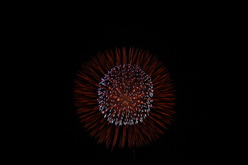 Fototapeta premium Fireworks at the riverbanks in Japan