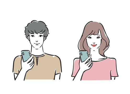 スマホを持つ爽やかな30代男女