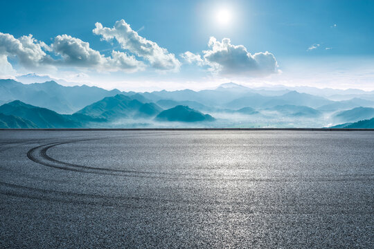 Empty asphalt road with green mountain range natural landscape in the morning - Powered by Adobe
