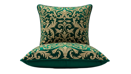 Two opulent velvet decorative cushions featuring ornate gold embroidery rest against a stark black background