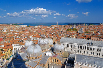 High angle view of Venice, Italy. Domes of St. Mark's Basilica and cityscape of terracotta rooftops