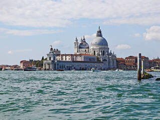 Grand Canal water and majestic Santa Maria della Salute in Venice, Italy