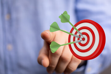 Image of a dart hitting a target, showing focus, hitting the mark, goal, success, achieving the target, aim, and motivation