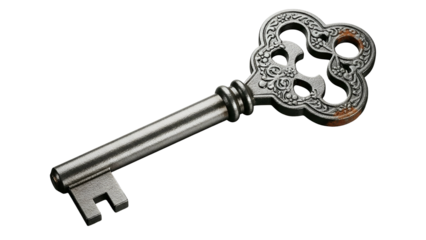 Ornate antique metal skeleton key rests against a deep black background