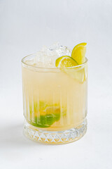 Cool drink filled with ice and lime, perfect for a summer gathering or celebration
