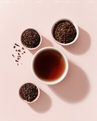 Assorted Loose Leaf Tea In Small Bowls On Pastel Pink Background