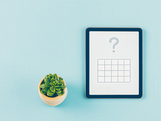 Digital tablet mock up displays an interactive quiz alongside a succulent plant, creating a modern educational atmosphere with copy space