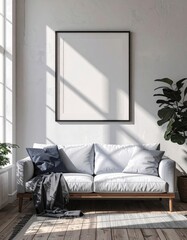 Modern sunlit living room with a blank poster frame mockup.