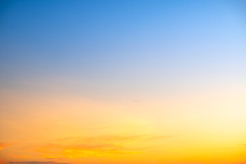 Beautiful , luxury soft gradient orange gold clouds and sunlight on the blue sky perfect for the background, take in evening,Twilight, Large size, high definition landscape photo