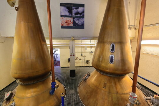 Vintage machinery (pot stills) of the 1794 established Oban Distillery meant for the Highland single malt Scotch whisky production. Oban-Scotland-020