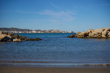In Cullera, Spain, the autumn sun casts a golden light on tranquil waters, inviting moments of reflection and serenity.