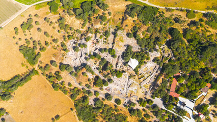 Tevfikiye, Turkey. Aerial view of the Schliemann's Great Trench cutting through multiple layers of Troy, exposing stone walls and earth. Aerial view