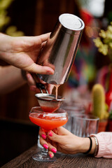 Aesthetically pleasing cocktail preparation at the bar