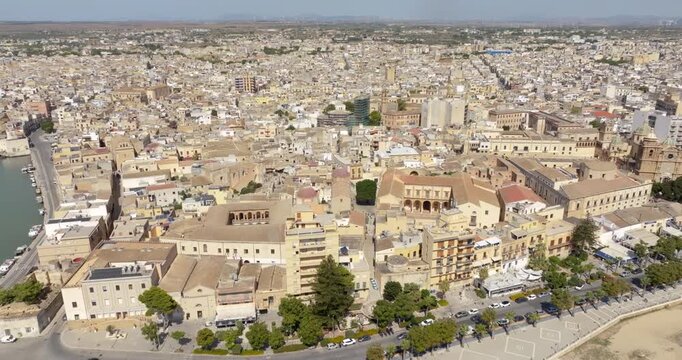 Aerial view of houses and buildings in the historic center of Mazara del Vallo, in the province of Trapani, Sicily, Italy. It's a beautiful sunny day.