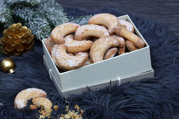 Christmas pastries: Traditional German or Austrian vanilla crescent cookies in a gift box.