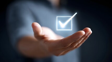 Conceptual image of an outstretched palm offering a luminous checkmark icon representing successful task completion verification choice and positive outcomes in technology or business