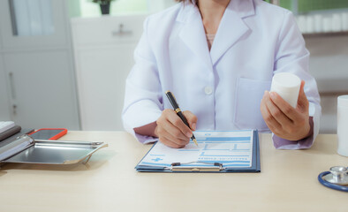 A female doctor examines a patient and explains her diagnosis to him via social media.