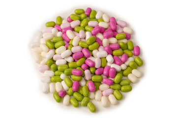 Sweet multicolored candies isolated on white background.
