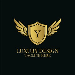 Elegant golden shield with wings and letter y logo design for brand identity and luxury business