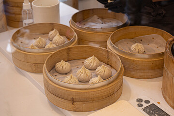 Dumplings in a bamboo steamer