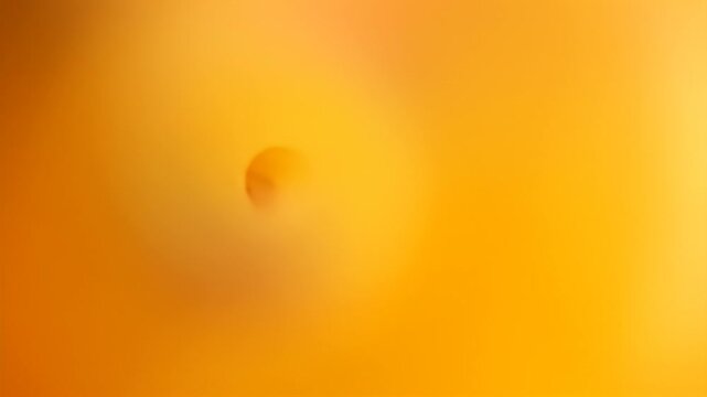 Abstract blend of orange hues, creating a soft, blurred gradient effect background