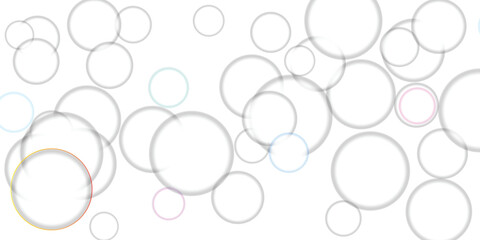 Collection of transparent soap bubbles with subtle iridescent highlights and pastel color accents floating on a clean white background, perfect for creative design elements