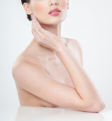 Beautiful young woman with clean skin nude topless breasts. Beautiful woman covering her nude breast. beautiful female figure. perfect skin.