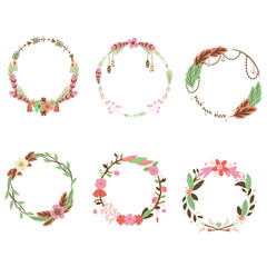 Elegant floral wreaths with feathers and berries create a soft and natural bohemian vibe, perfect for invitations, logos, and branding projects