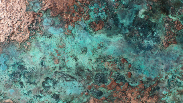 Intricate close-up of a naturally weathered copper surface, showcasing stunning verdigris and rustic bronze tones, creating a beautiful oxidized metallic texture