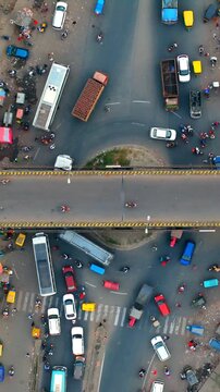 Extreme 4K Top-Down Drone View of Chaotic Indian City Traffic Overpass and Intersection.