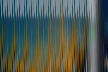 Vertical lines with blue and yellow gradient effect 