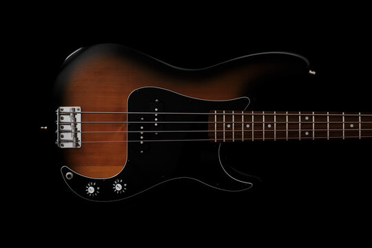Bass guitar on black background. Music wallpaper