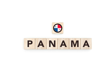 Wooden blocks bearing the name and flag of Panama. Panamanian and Caribbean Culture, national identity, travel, and geography in an advertising space design.